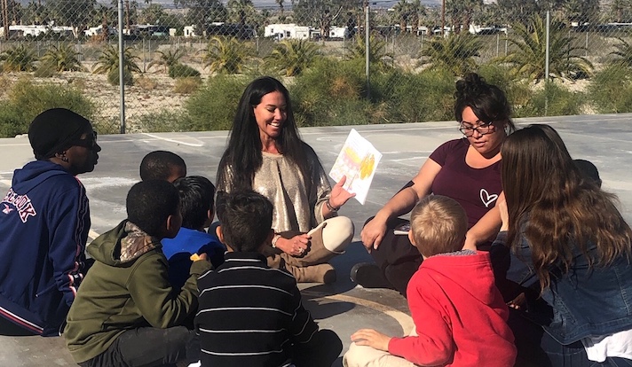 Kelly Levy spends time with children at Father's Heart Ranch
